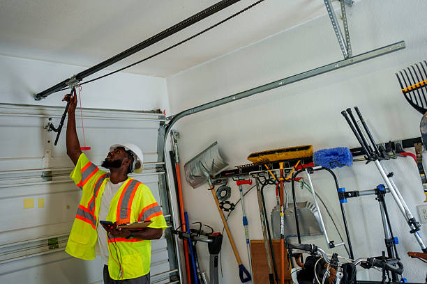 Professional Garage Door Spring Repair technician working in Waukegan, IL